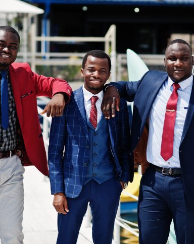 Three african american happy succesfull mans at suit. Rich black business mans.